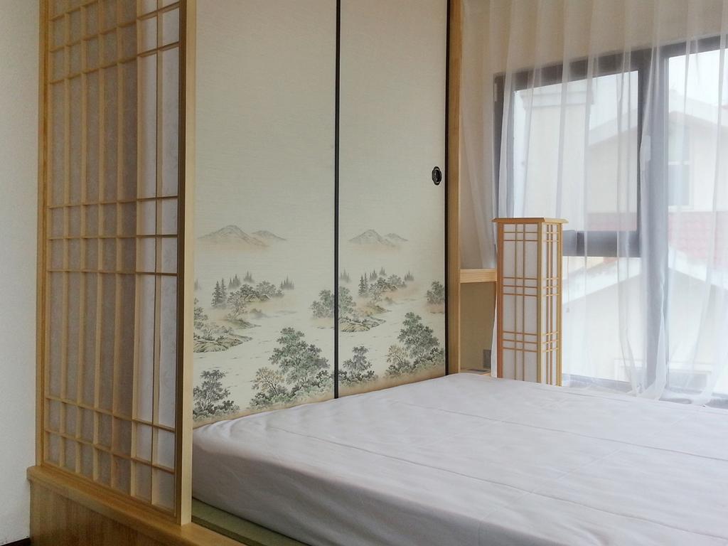 Villa Inn No.21 Seaside Qingdao Rum bild