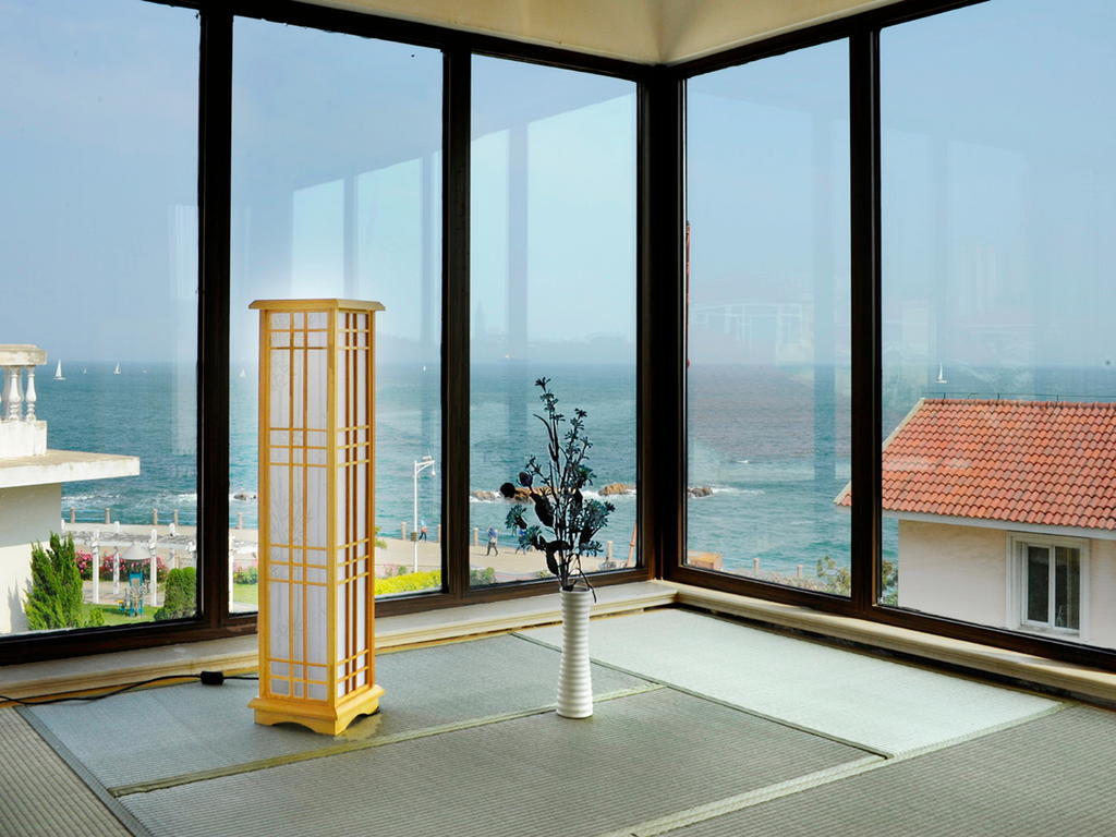 Villa Inn No.21 Seaside Qingdao Rum bild